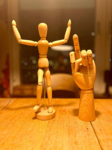 Wooden artist models including jointed figure and hand model