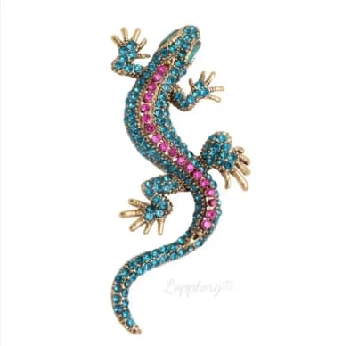 Discreet golden gecko pin in retro vintage style