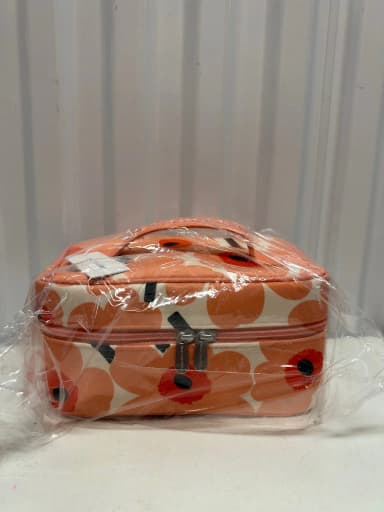 Marimekko meikkipussi oranssilla kuviolla