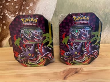 Two Pokémon TCG Mega Gengar EX metal tins available