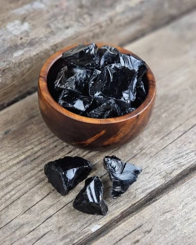 Small raw black obsidian stone