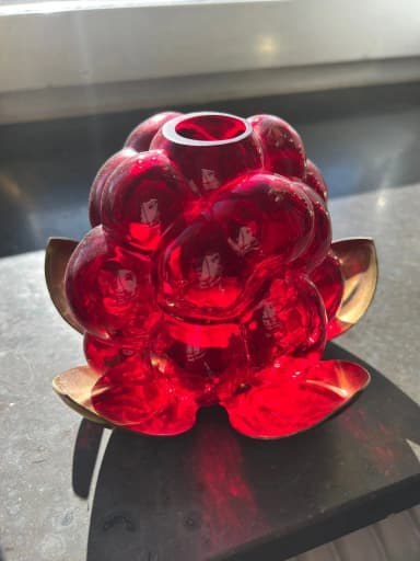 Red glass lantern with brass base by Gunnar Muskos