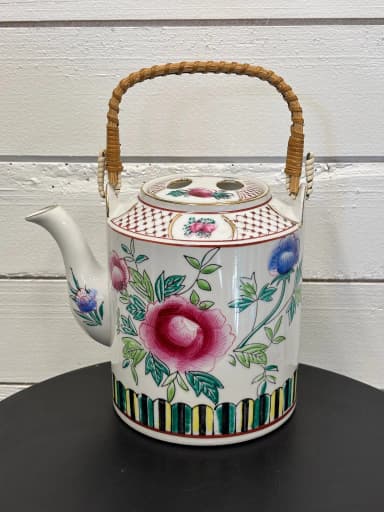Porcelain teapot with wicker handle from Japan