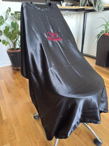 Wella Professionals hairdressing cape available