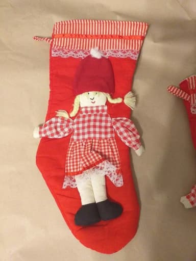 Embroidered Christmas stocking with festive girl design