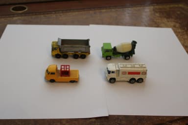 Collection of 4 model cars including Matchbox and Corgi tankers