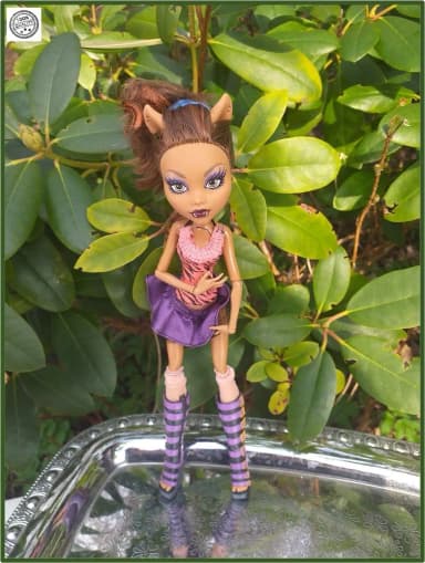 Monster High doll from 2008 with colorful outfit by Mattel