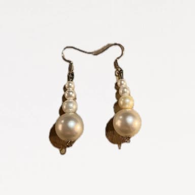 White earrings available at auction