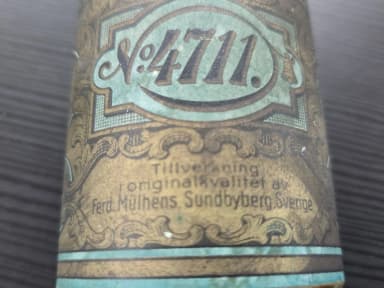 Two vintage 4711 Eau de Cologne bottles in blue and gold