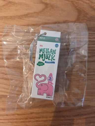 Pink Ribbon 2026 keychain shaped like a milk carton