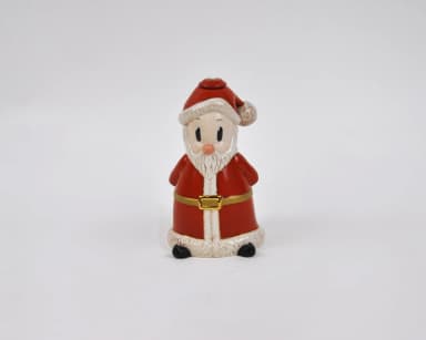 Öllampe von Stefan Lindahl mit Puff und Weihnachtsmännern aus Disney Collection