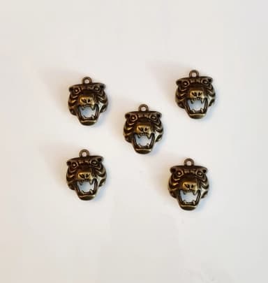 Tiikerinpää-riipukset myynnissä