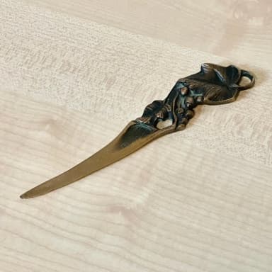 Art Nouveau bronze letter opener with antique vine design