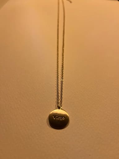 Necklace with Virgo (virgin) motif