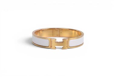 Pulsera Hermès H con esmalte blanco y baño de oro